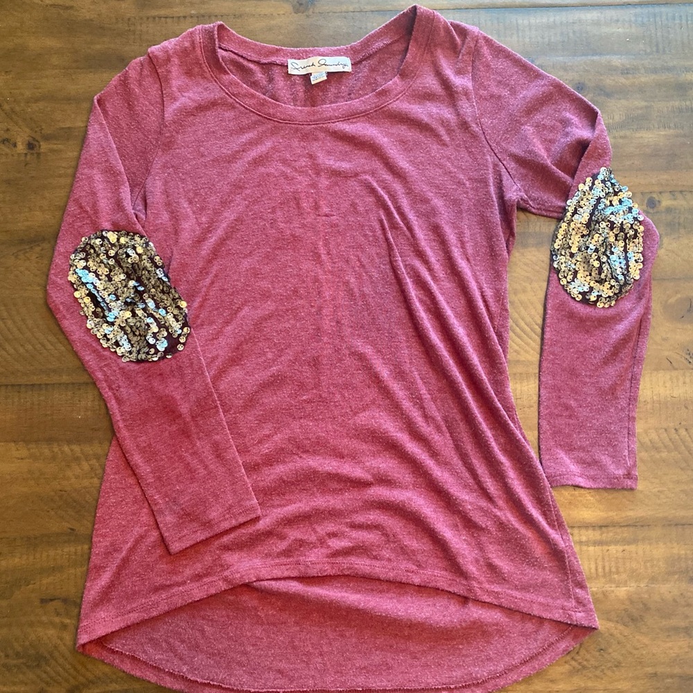 Shirt with elbow detail